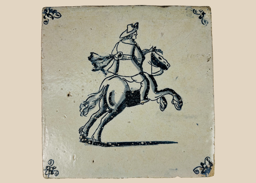 18th century Dutch Delft tile with cobalt blue horseman decoration