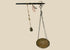 Antique Indian steelyard balance scale, circa 18th–19th century, with forged iron beam, engraved calibration notches, bronze hanging pan, and original cast bronze weight with woven cord. Traditional Mughal/Colonial trade tool with rich aged patina.