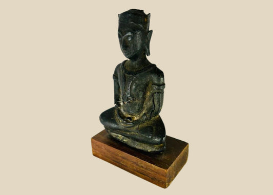 Small 18th–19th century Southeast Asian cast bronze Buddha statue in meditative pose with serene expression and headdress, mounted on a wooden base, 5.5 x 2 x 3.25 inches, Thailand or Burma.