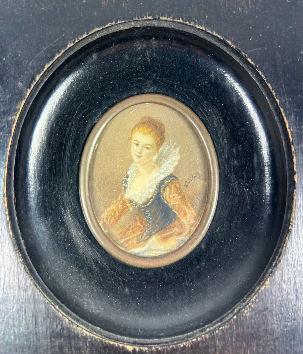 Mid–late 19th century Continental European portrait miniature of a young woman in historicizing costume, watercolor on wafer in ebonized frame.