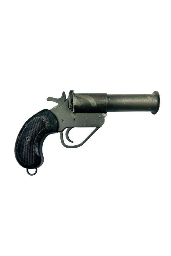 19th century pinfire signal pistol with black grip and metal barrel, antique flare gun photographed on neutral background for Relic & Rarity