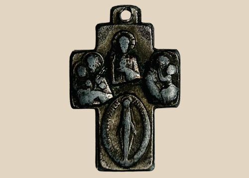 19th century bronze Christian cross pendant with Marian devotional imagery and suspension loop, reportedly recovered near a historic Nova Scotia shipwreck site