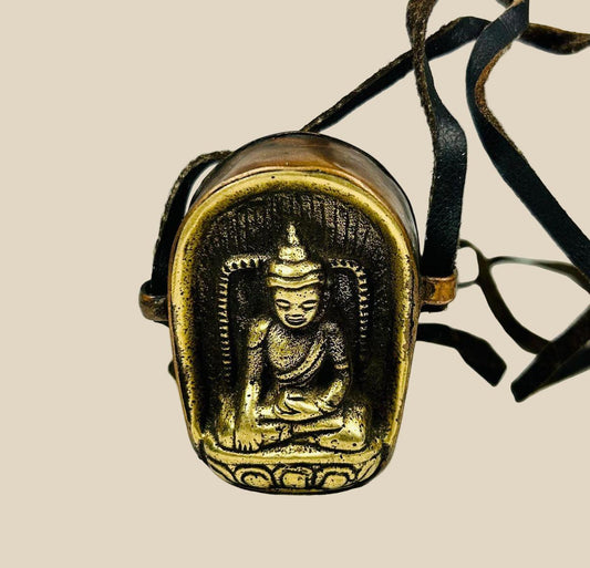 Antique 19th-century Tibetan Buddhist Gau amulet box, gilt bronze front with Shakyamuni Buddha seated in meditation on lotus throne, original leather strap and removable back panel, Qing Dynasty devotional portable shrine.