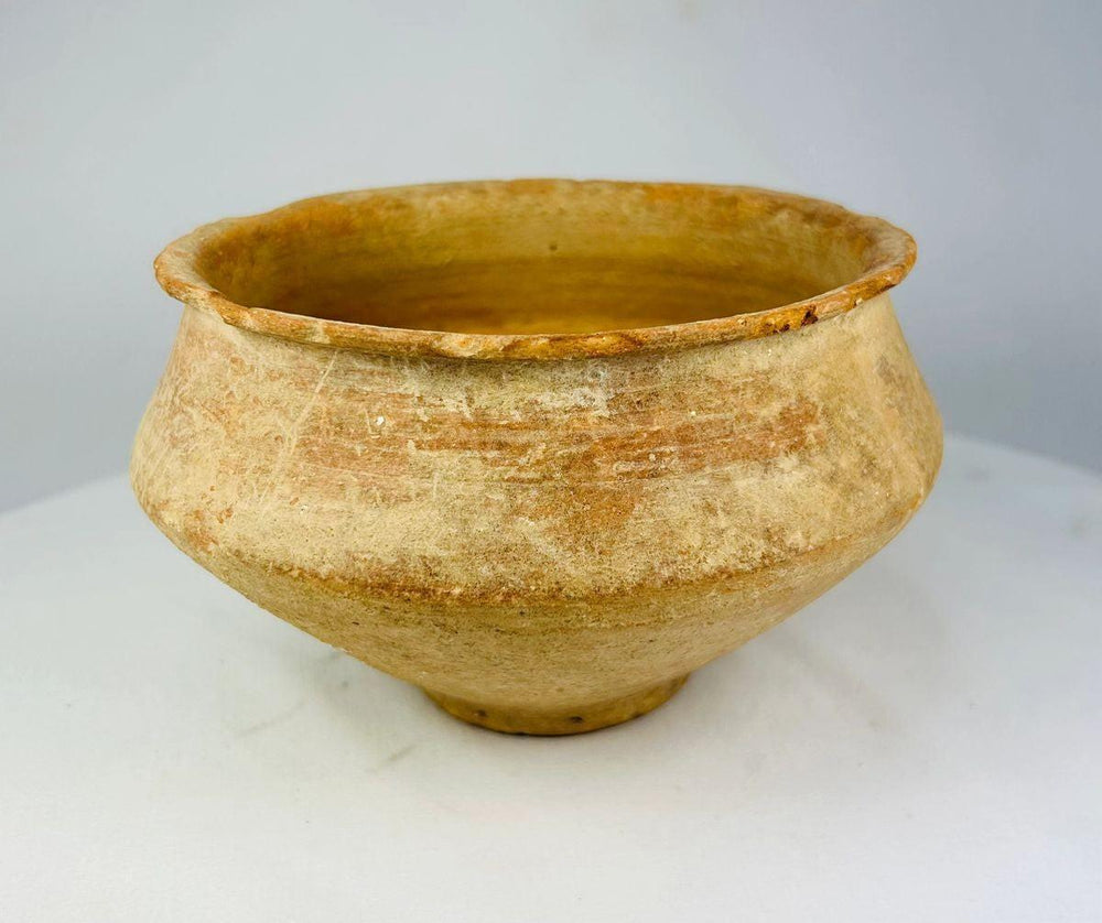 Terracotta bowl from the Bronze Age with coarse clay texture and wheel marks