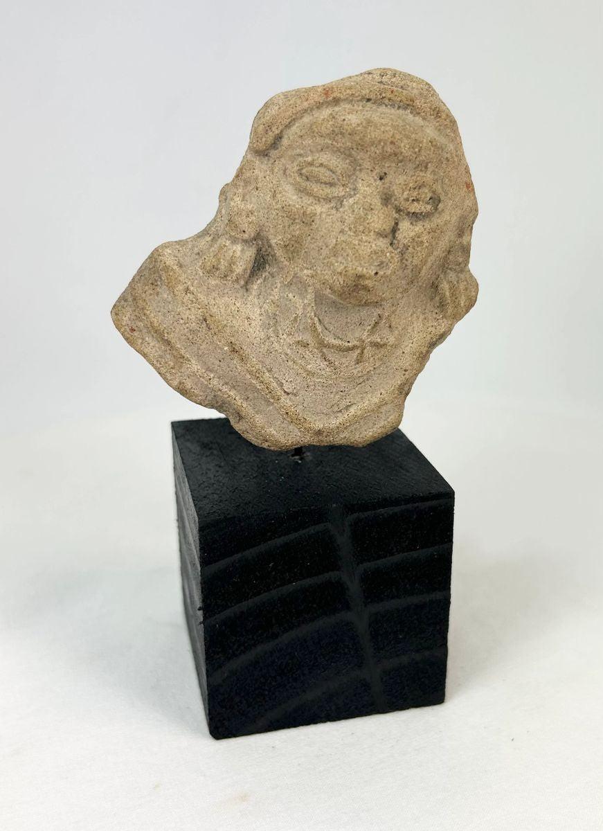 Nayarit or Jalisco terracotta figure fragment with almond-shaped eyes