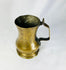 English George II period brass tankard showcasing 18th-century craftsmanship