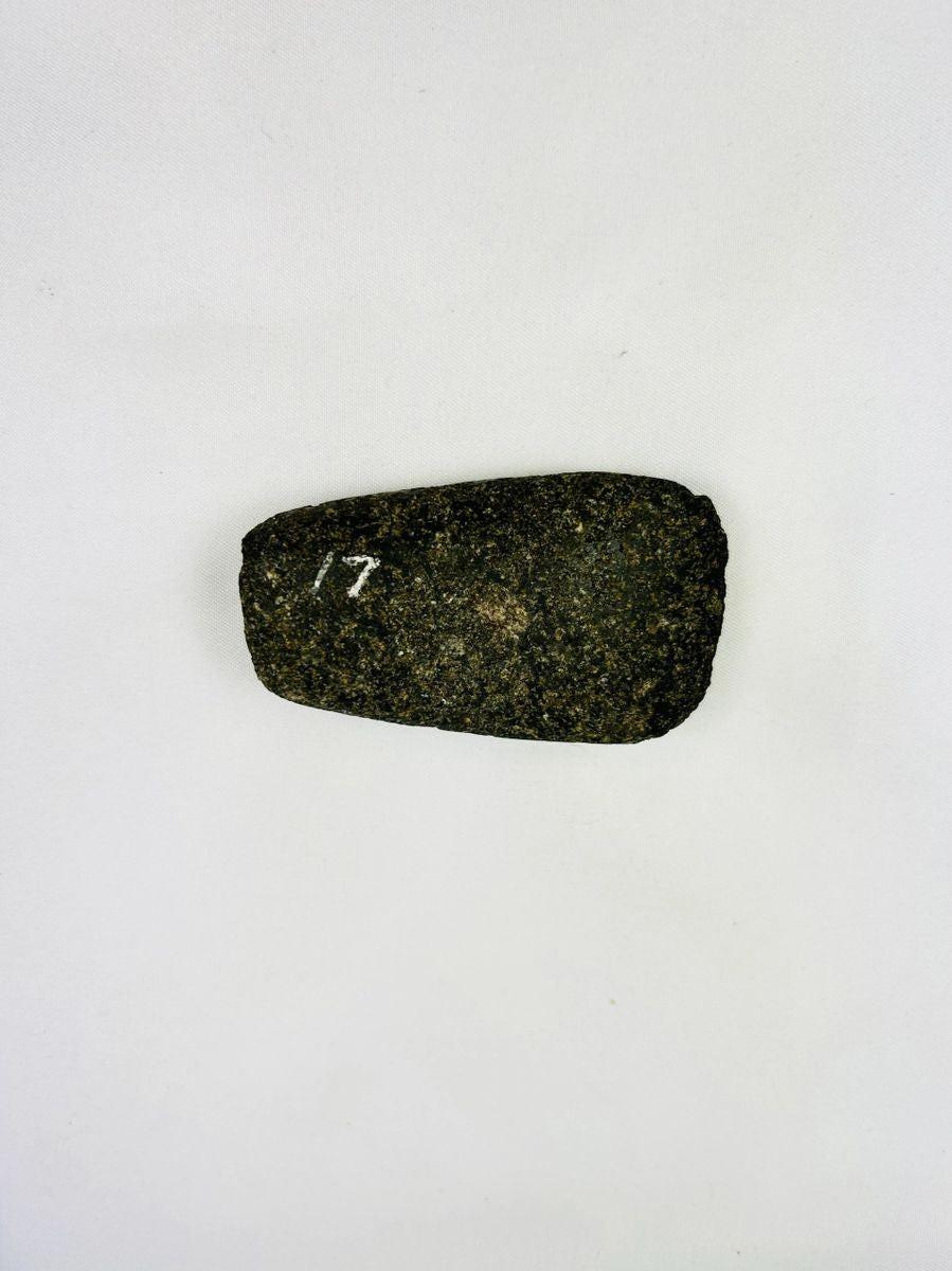 Small utilitarian Andean stone axe with beveled cutting edge and worn patina