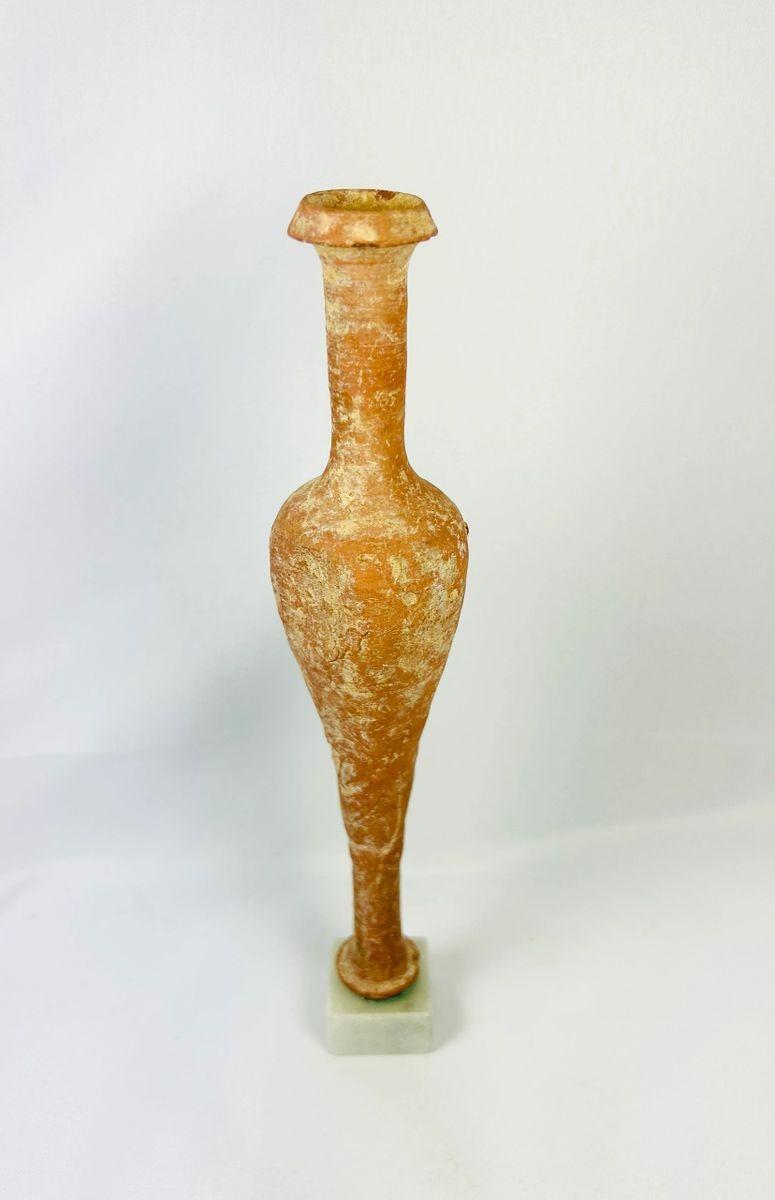 Elegant Hasmonean terracotta bottle from Judea with naturally aged patina
