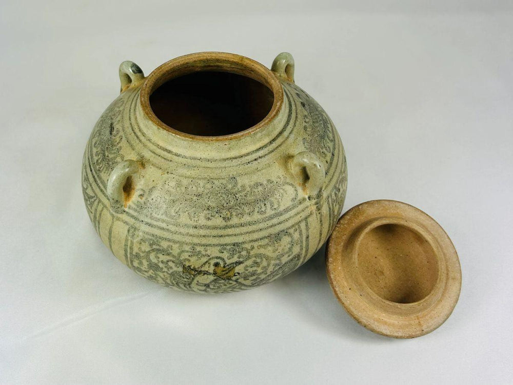 Thai Sawankhalok glazed stoneware bowl, 14th–16th century CE, decorative birds, beasts, and floral patterns