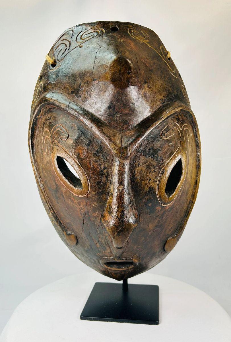 Close-up of carved eyes and nose on a Sepik River wooden mask
