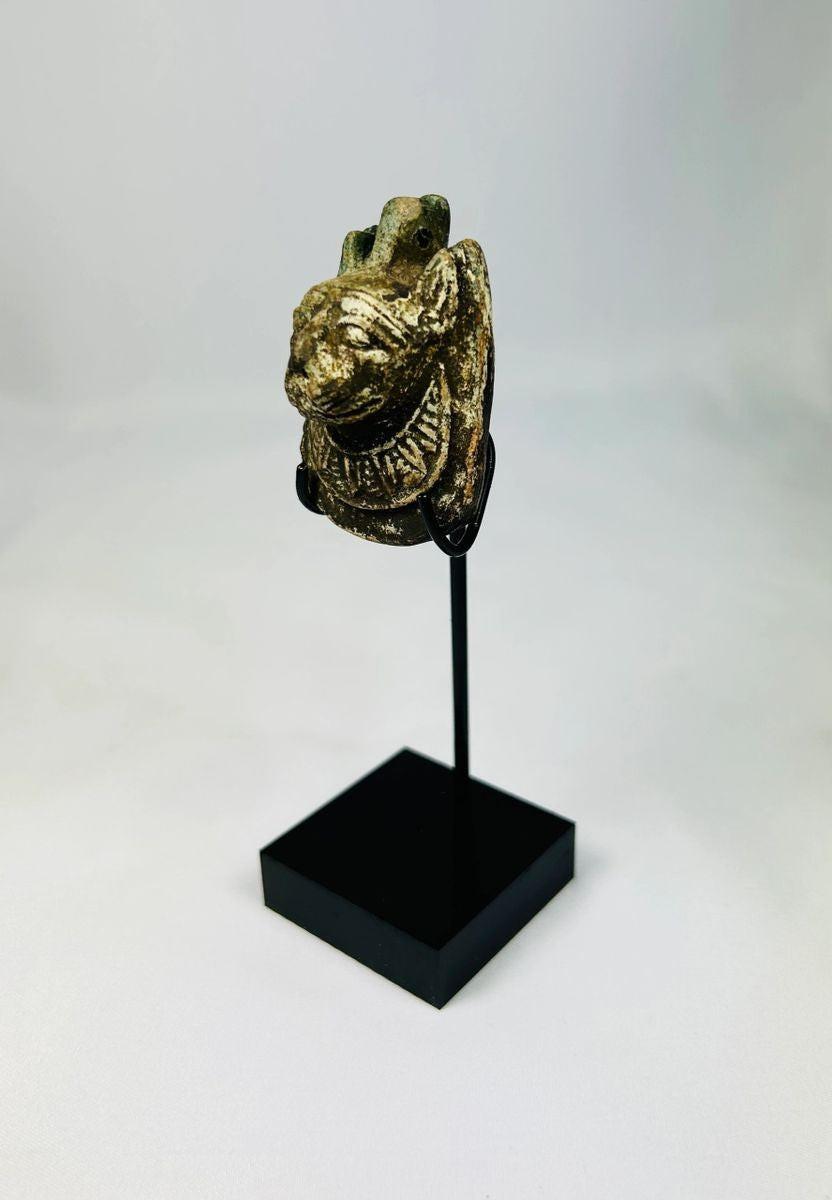 Ancient Egyptian personal amulet depicting Maahes, Third Intermediate Period, compact charm with detailed carving