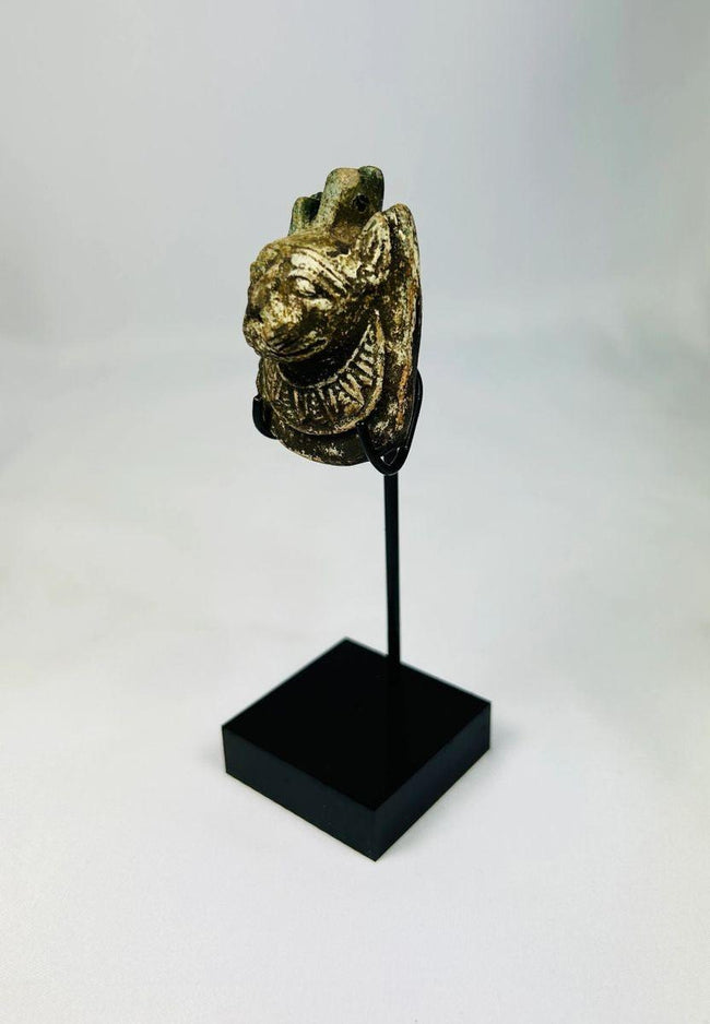 Ancient Egyptian personal amulet depicting Maahes, Third Intermediate Period, compact charm with detailed carving