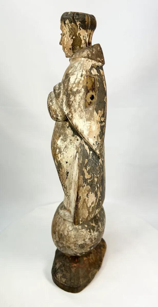 17th–18th century Spanish Colonial devotional santo figure carved from wood, shown standing on an integral rounded base.