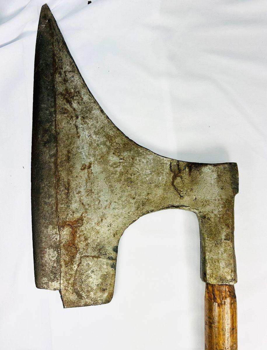 18th-century German or Scandinavian executioner’s axe, broad iron blade, and aged wooden handle.