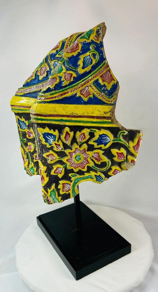 Late 18th-century polychrome corner tile with floral and geometric decoration