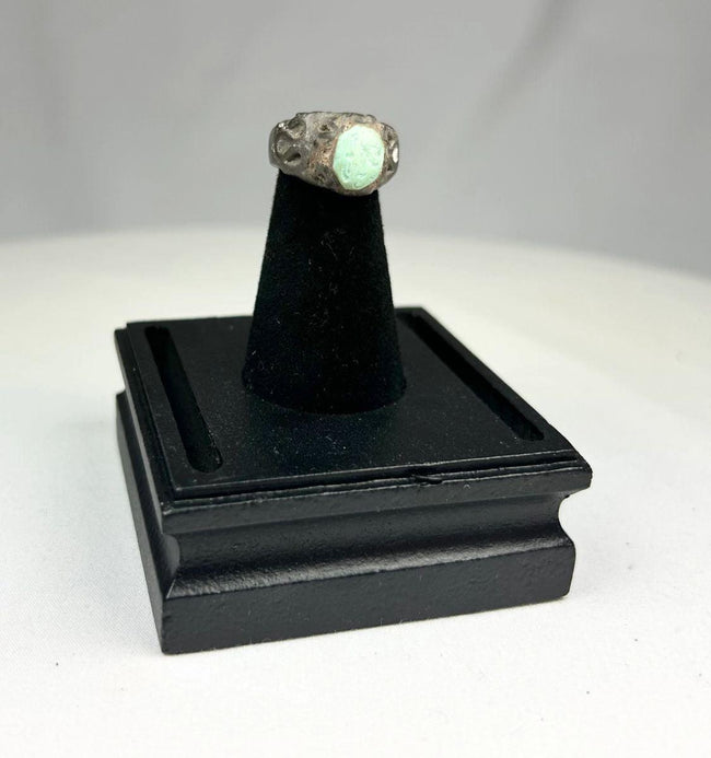 Antique silver ring from Neo-Assyrian Iraq with raised turquoise and engraved designs