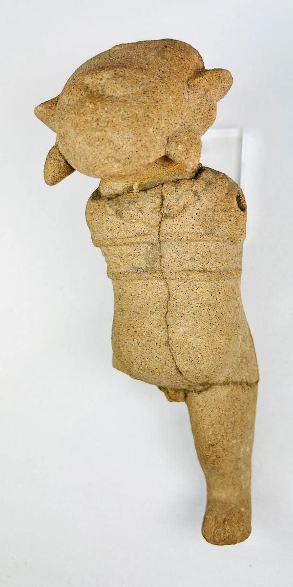 Front view of a Pre-Columbian ceramic figurine from Mesoamerica, circa 500–1500 CE