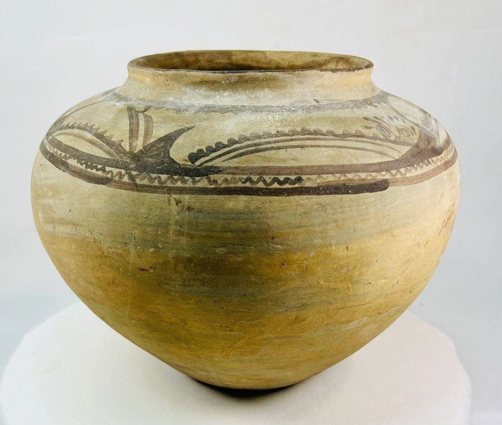 Close-up of painted slip patterns on Early European Neolithic vessel surface.