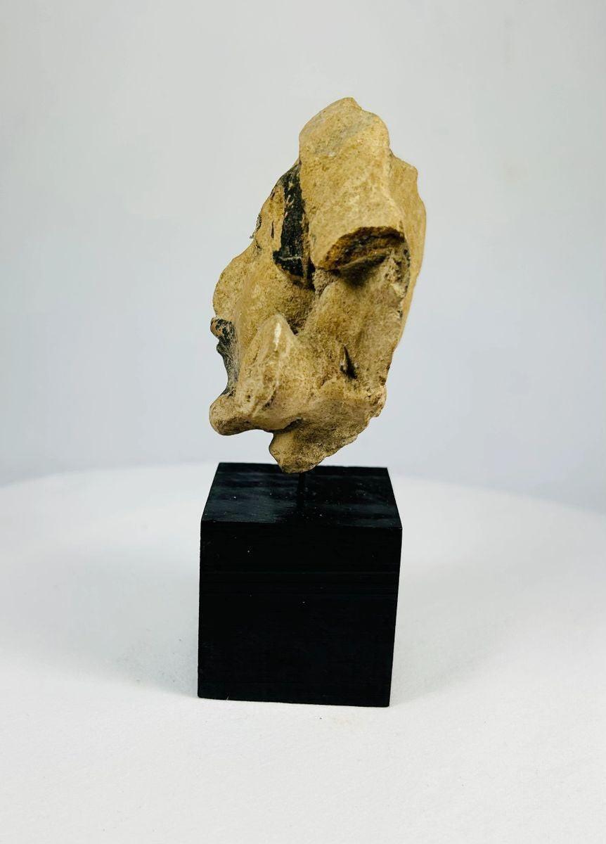 Mesoamerican Late Classic Period head fragment with intricate turban design