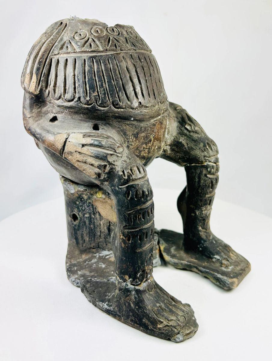 West Mexico terracotta figure with geometric carvings and aged surface