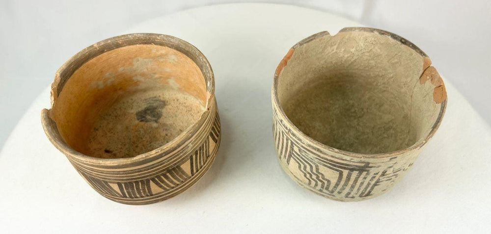 Harappan terracotta bowls showing surface wear and aged earthen patina