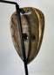 African Baule ritual mask with natural aged patina and incised decorative markings
