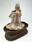 Seated Tang Dynasty female musician playing pan flute terracotta figure