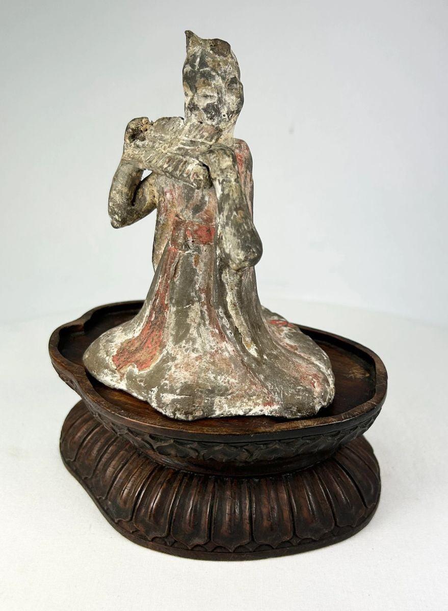 Tang Dynasty terracotta female court musician figure with pan flute and pigments