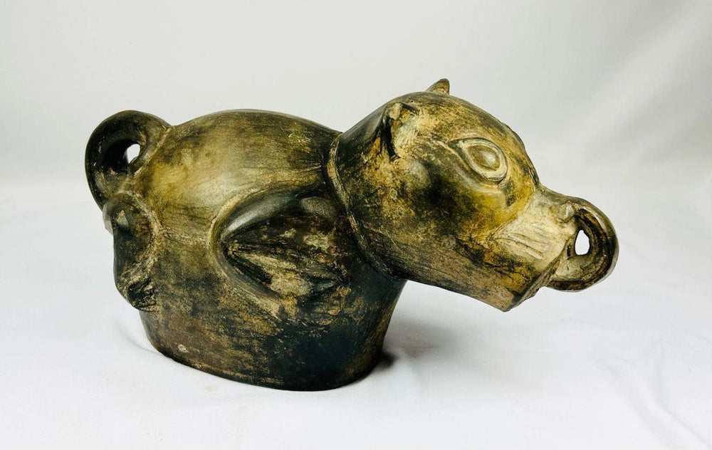 Ancient Peruvian terracotta vessel Moche culture functional and ritual object