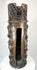Historic Japanese shrine pillar carving featuring floral and scrollwork designs