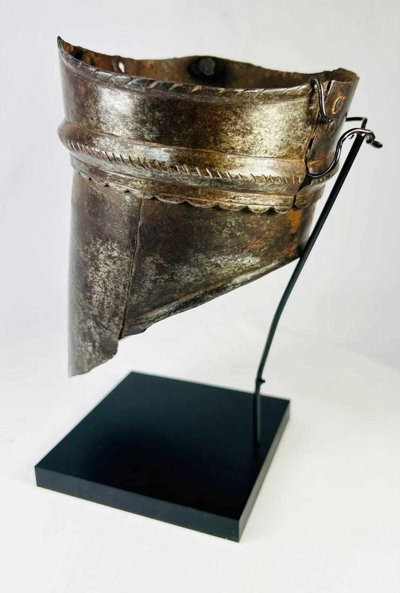 Antique European arm defense plate, cylindrical form with rivet holes and mid-band incising, circa 1500s armor fragment.