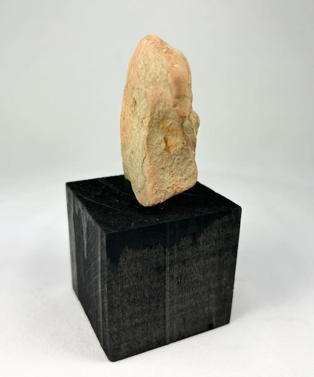 Ancient Gandharan plaque with reddish-brown terracotta surface and figures