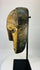 Traditional Côte d’Ivoire Dan mask with carved wood and ritual wear