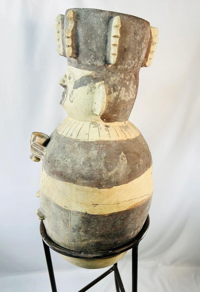 Chancay funerary urn with painted designs and ceremonial significance