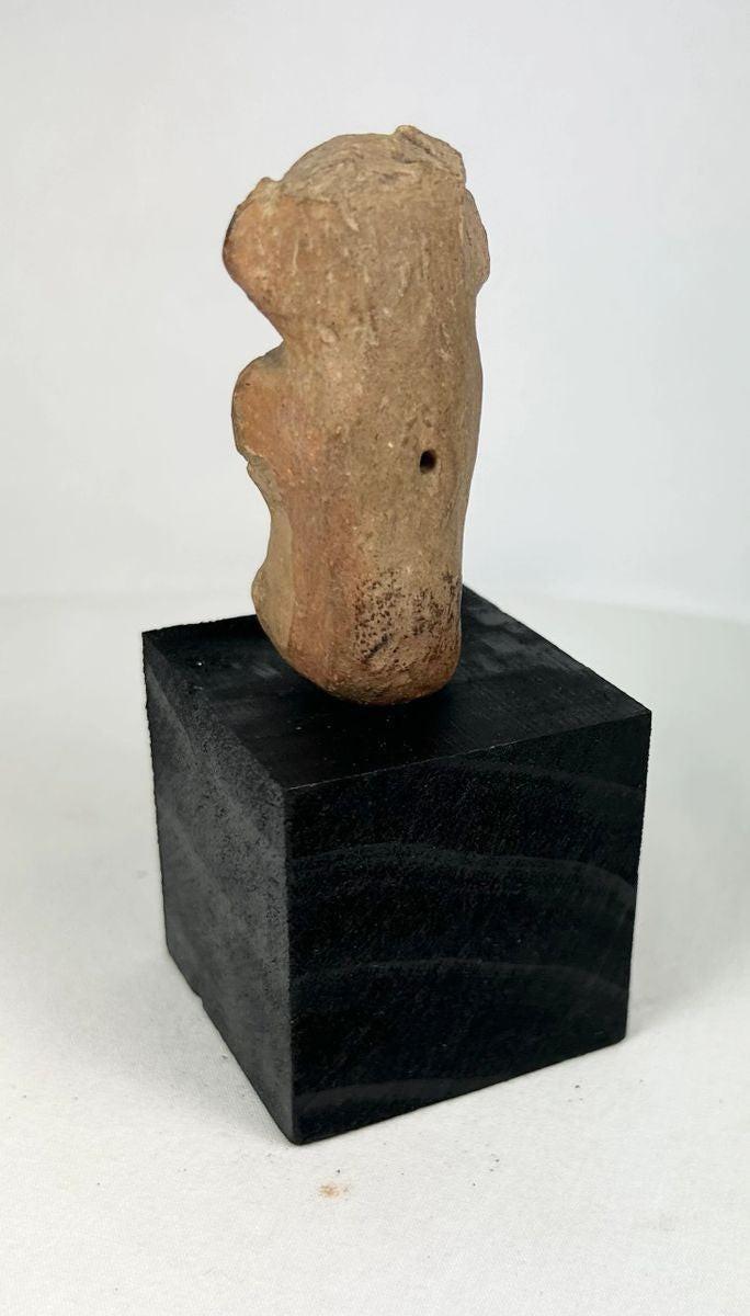 Late Classic Veracruz terracotta female figure with pierced back for suspension