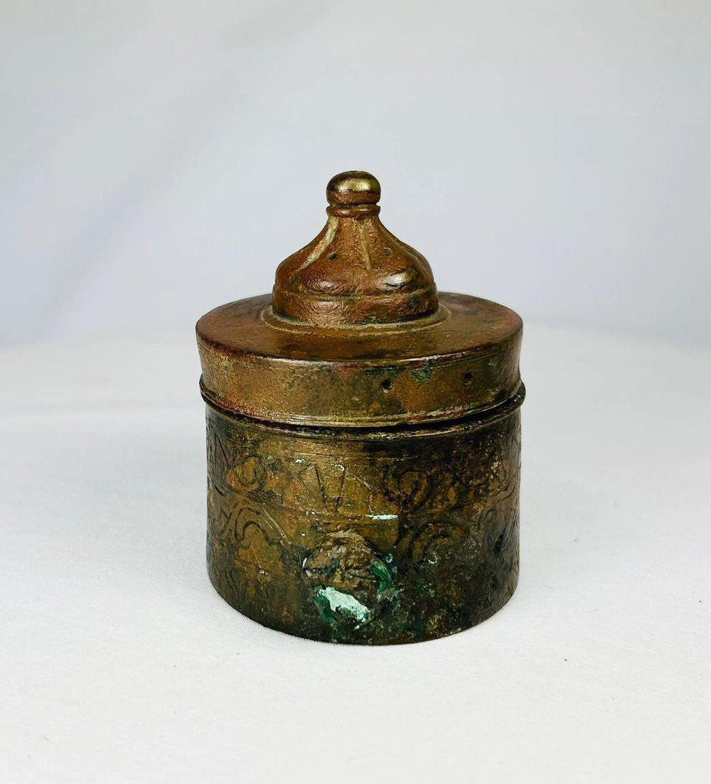 Medieval Islamic bronze inkwell from Khorassan, featuring geometric engraving and natural aged patina