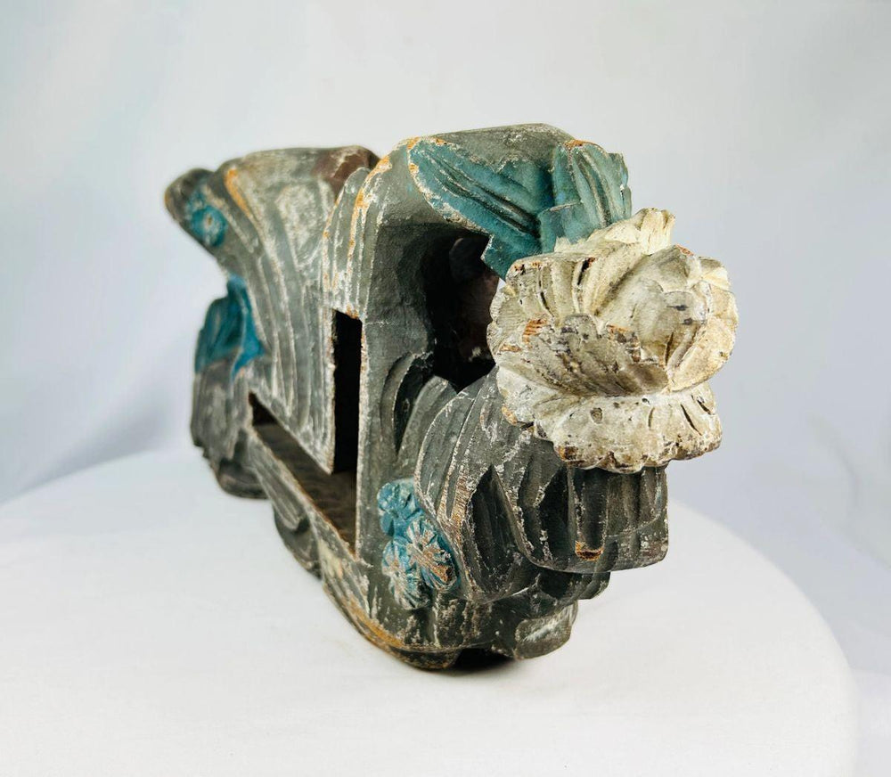 Side view of an antique Chinese Qilin temple carving in hand-carved hardwood