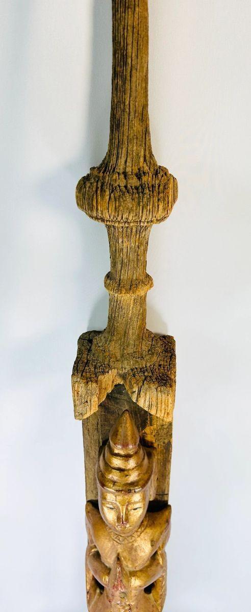 Monumental Myanmar temple finial with carved spire and traces of original gold leaf