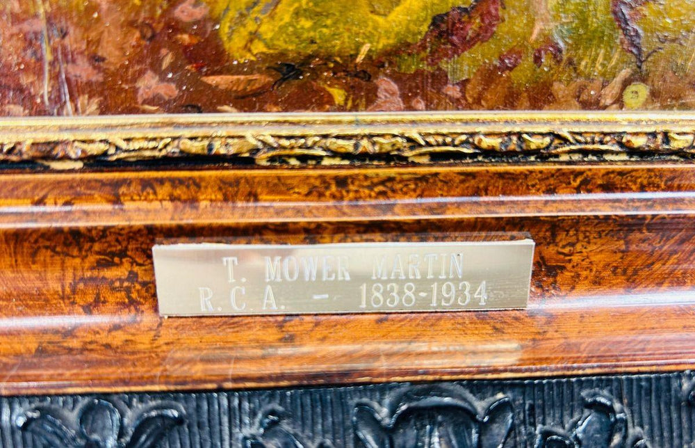 Close-up of the artist attribution plaque reading "T. Mower Martin R.C.A. 1838–1934" mounted on the ornate frame of the oil painting.