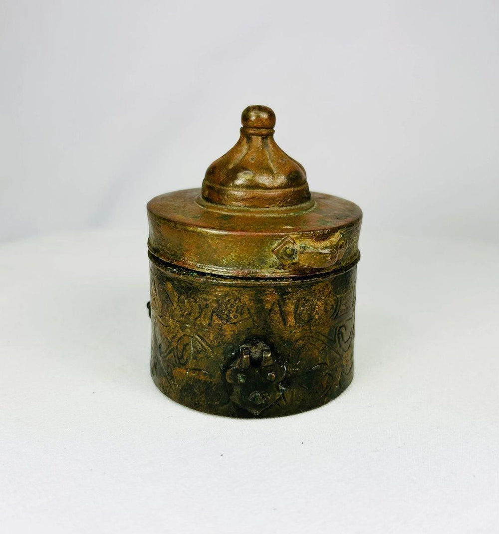 Antique Islamic bronze inkwell with cylindrical body and domed lid, showcasing Khorassan craftsmanship
