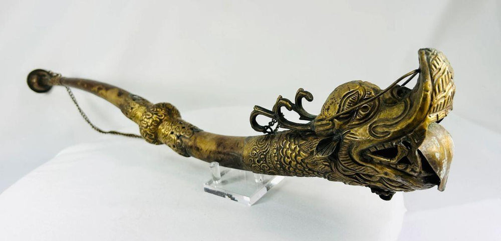Antique Tibetan Buddhist ritual horn with detailed dragon sculpture