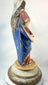 27-inch hand-carved wooden Madonna holding the Christ Child with golden orb, polychrome surface with visible historic wear and craquelure.