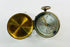 Antique French expeditionary pocket compass in brass case with original glass face and magnetic needle.