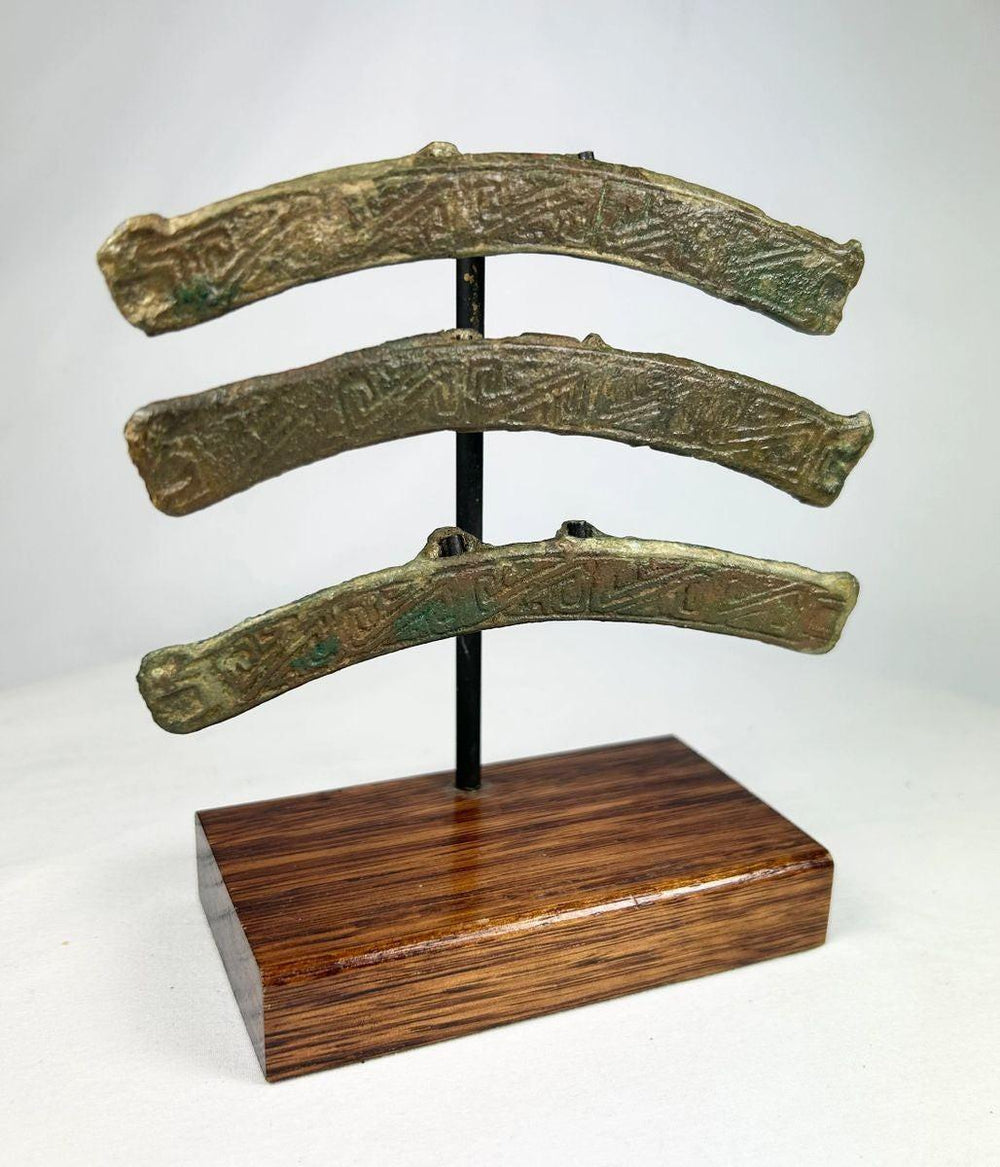 Ancient bronze fittings from Chinese chariot with curved form and detail