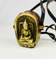 Tibetan Gau prayer amulet box showing Shakyamuni Buddha seated in meditation.