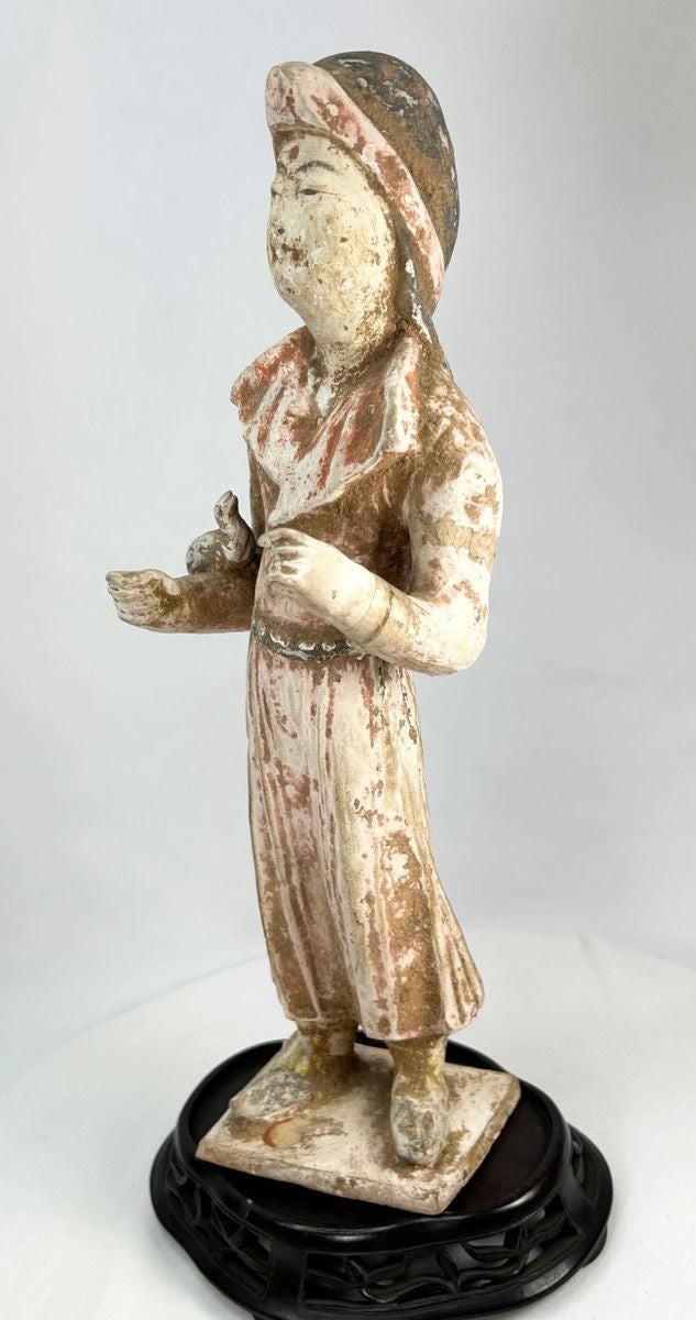 Tang Dynasty terracotta female court attendant with traces of original pigment, China, circa 618–907 CE