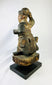 Historic Qing Dynasty temple guardian statue with raised arm, ornate armor, and worn red-gold pigment, 11-inch carved wooden figure.