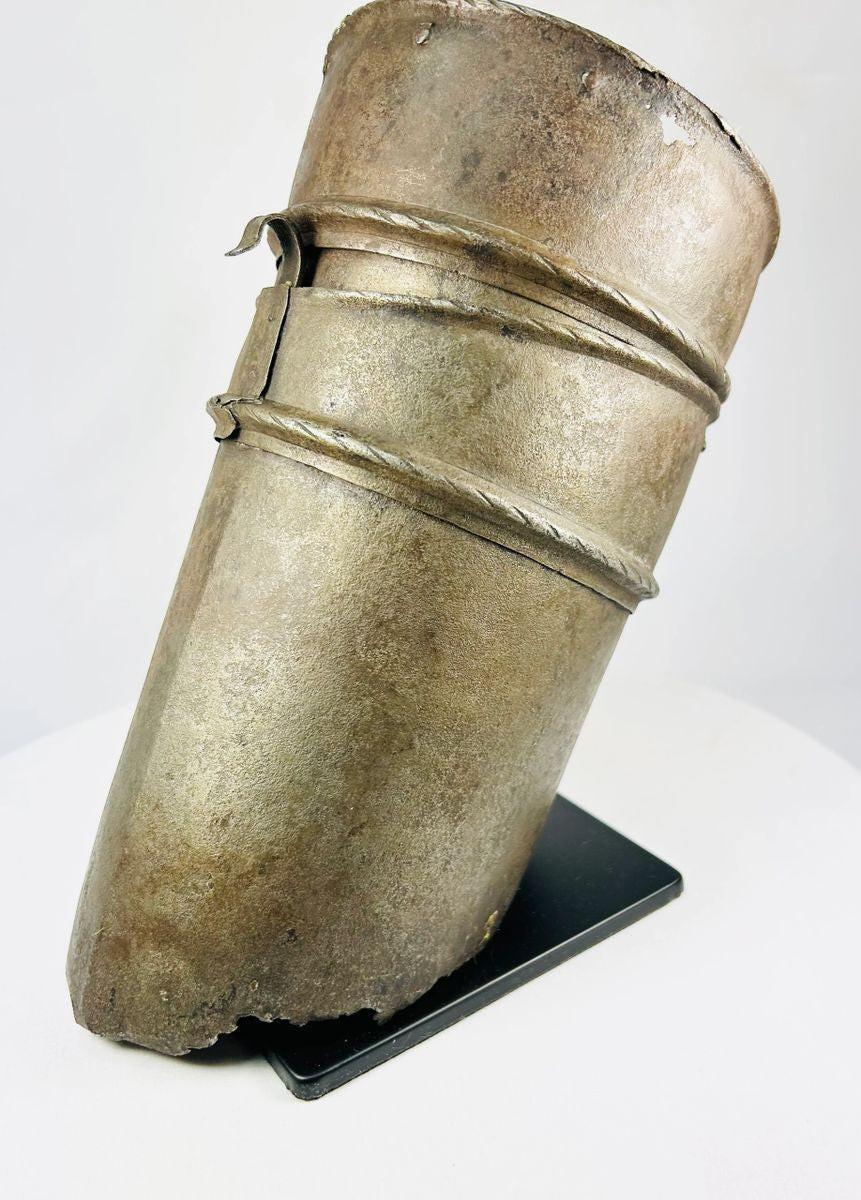 Knight’s cannon-style arm defense with riveted design and aged patina