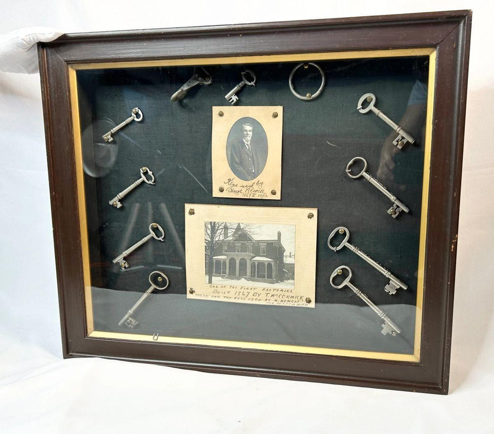 Framed 1800s key set and portrait of night watchman Hugh Newell