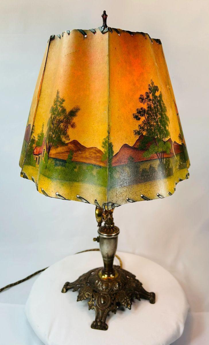 Antique French or Dutch Art Nouveau lamp showing pastoral village scenes on parchment shade